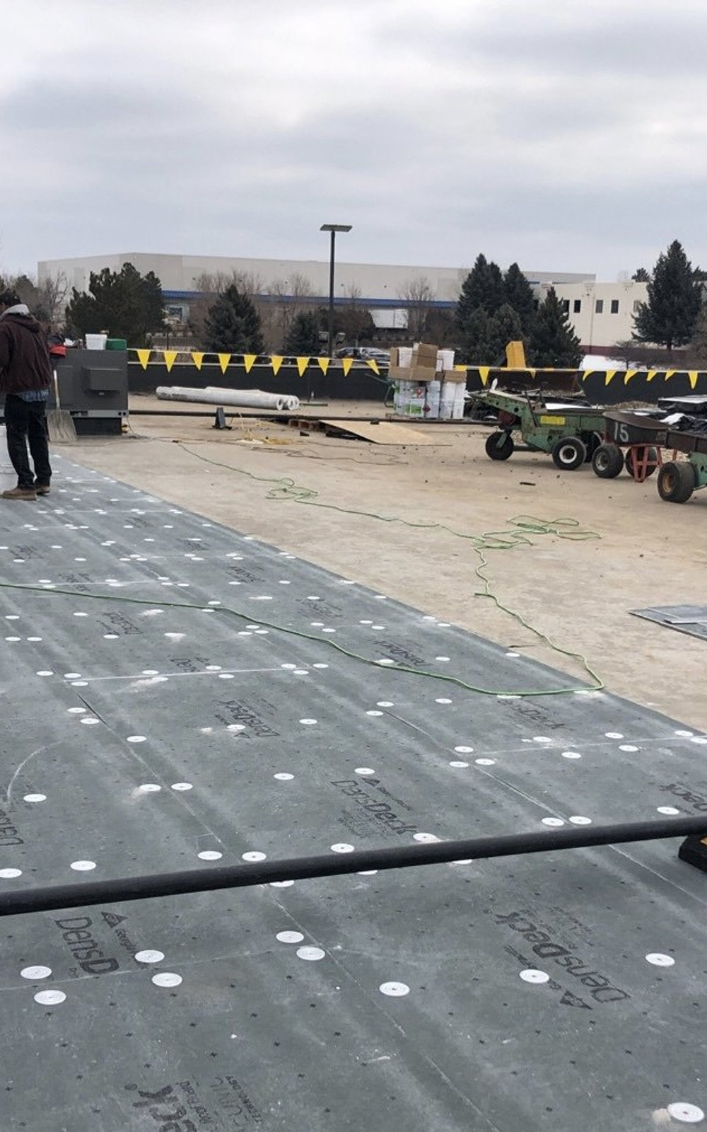 DensDeck primed cover board installed on a commercial flat roof